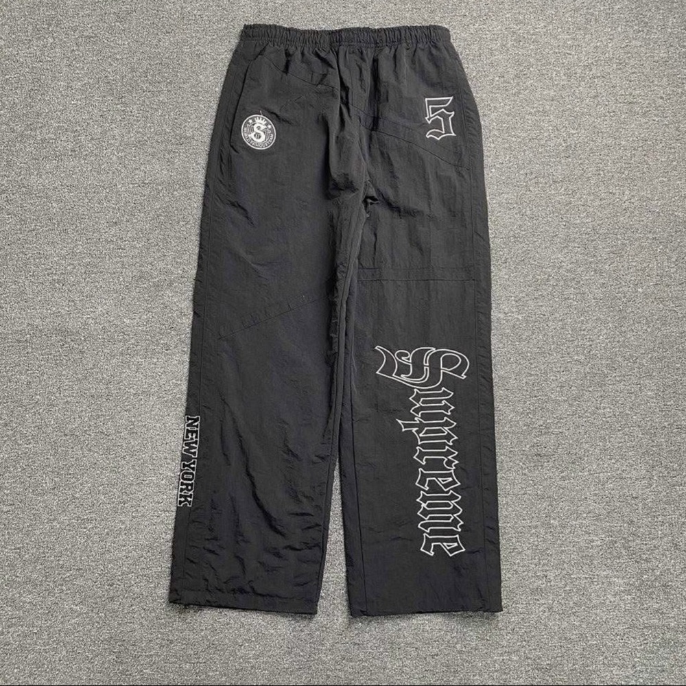 Supreme Black Joggers with Graphic Details
